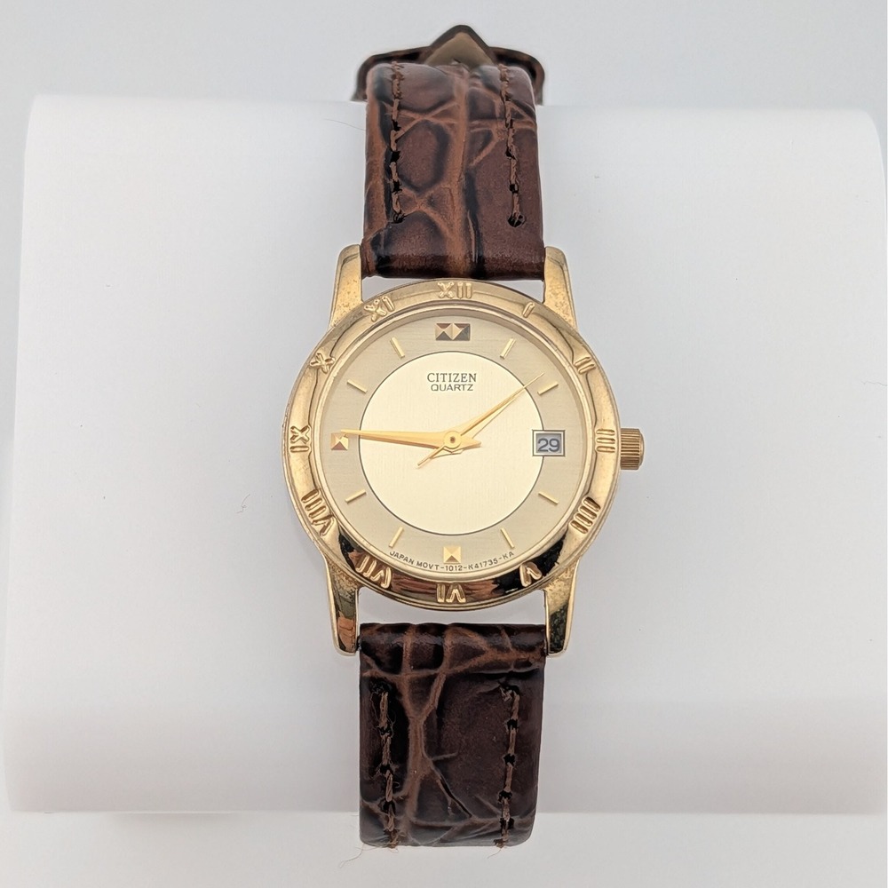 Vintage Citizen Quartz 1012-K13131 Gold Tone Roman Bezel Date Women's Watch 24mm
